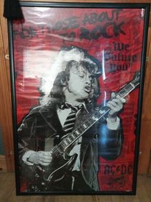 AC/DC poster framed 25 1/2 inches by 37 1/2 inches