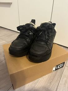 UGGs black sneakers with white fur
