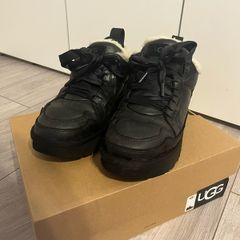 UGGs black sneakers with white fur