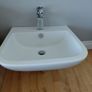 Wall hung bathroom sink with chrome Tap Image 2