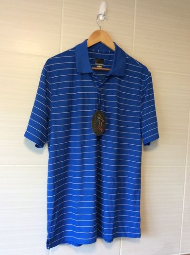 Brand New. Greg Norman Mens Golf Polo Shirt. Retail At 50euro. Selling 25euro. Collect In Dublin Or Receive Via Post.
