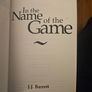 In The Name Of The Game. By J.j. Barrett. First Edition Paperback In Good Condition.  See Photos For Same. Image 2