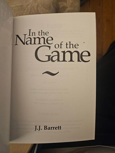 In The Name Of The Game. By J.j. Barrett. First Edition Paperback In Good Condition.  See Photos For Same.