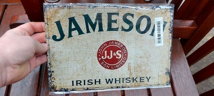 Jameson irish advertising whiskey metal repo sign  ,,buyer collects or pays postage thank you, lovely advertising display item, nice for home bar or man cave pub restaurant etc, or present, sold as seen .