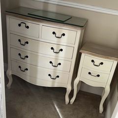 chest of drawers and bedside table