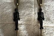 candlestick with a skeleton