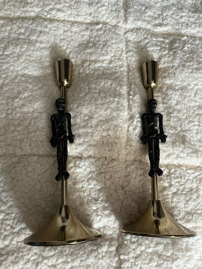 candlestick with a skeleton