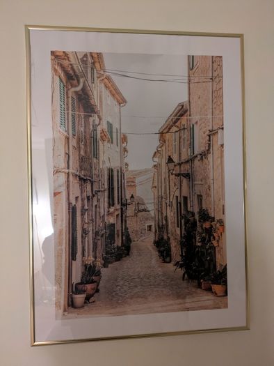 Framed art in gold frames
