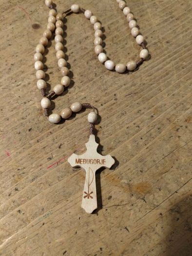 handmade wooden rosary from Medjugorje featuring a cross with the town's name engraved on it. New never used