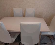 Glossy top Dining table with 6 chairs.