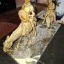 Rare Don Quixote and Sancho Panza cast in patinated bronze and mounted onto a veined marble plinth base. Don Quixote is depicted atop his gaunt horse, Rocinante, holding his shield, while his squire Sancho Panza follows Image 6