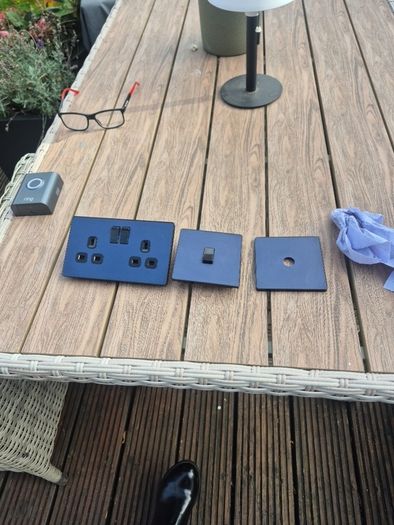 Navy blue socket and light switch