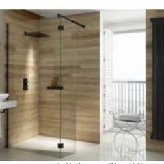 Wetroom with hinged flipper panel in chrome