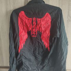 Black shirt with wings print fits size medium