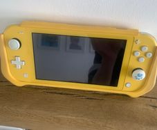 Nintendo switch console and yellow rubber cover