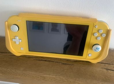 Nintendo switch console and yellow rubber cover