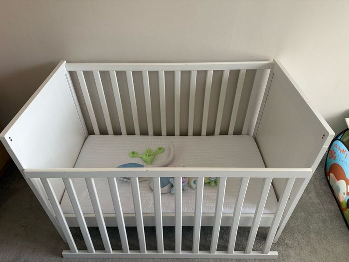 cot bed with mattress and remote toy