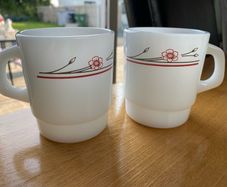 A Pair of Termocrisa Milk Glass Mugs