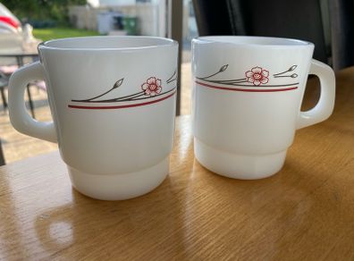 A Pair of Termocrisa Milk Glass Mugs