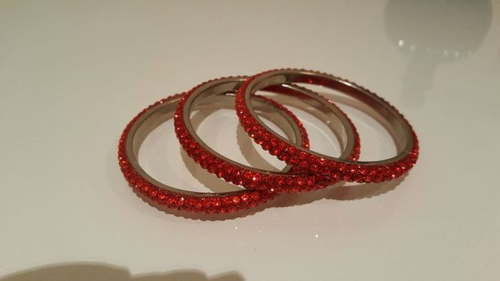 Three Chica red bangles