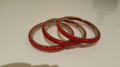 Three Chica red bangles