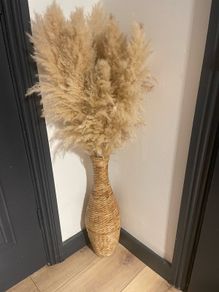 Vase with dry natural plants