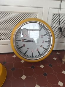 large clock and pendant light