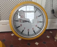 large clock and pendant light