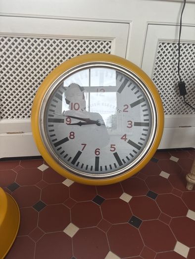 large clock and pendant light
