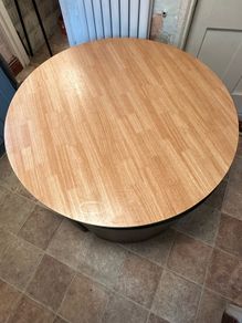 Round nested dining table and 4 chairs.