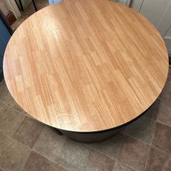 Round nested dining table and 4 chairs.