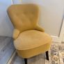 Soft yellow lounge chair from ikea Image 2