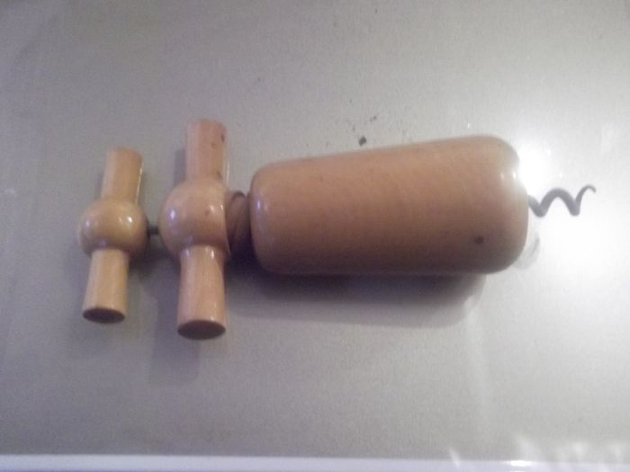 a vintage wooden  cork screew working