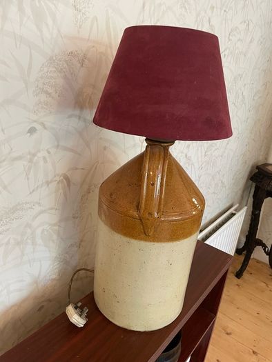 Unique rustic vintage table lamp crafted from a traditional stoneware flago