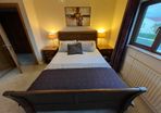 Beautiful Queen Sized solid sleigh mahogany bed