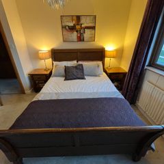 Beautiful Queen Sized solid sleigh mahogany bed
