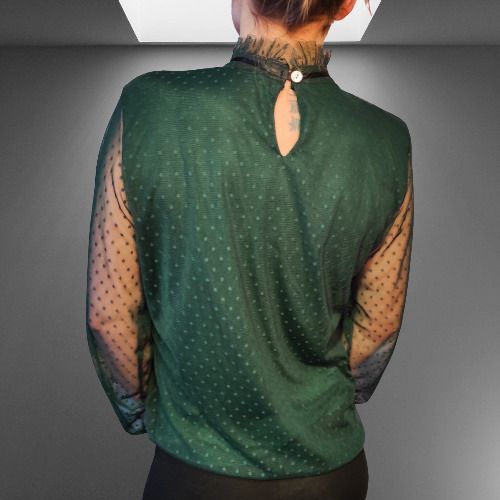 Lace blouse with a bow at the neck