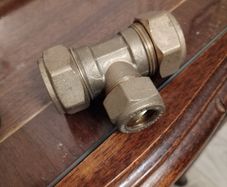 Plumbing compression T