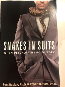 Snakes In Suits
