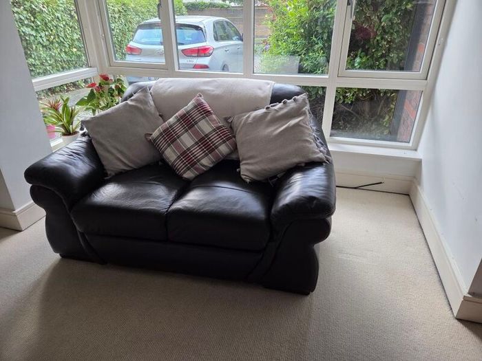 Set of 2 black leather couches for sale