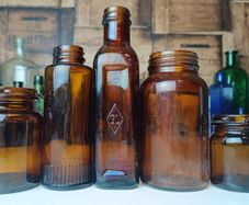 485 - Set of 5 Vintage Brown Amber Glass Screw Top Collectible Decorative Bottles