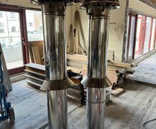 Insulated gas fire chimney flues