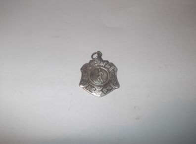 a solid  irish  silver medal  for running