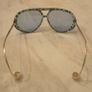 Aviator sunglasses with blue lenses and gold-tone arms Image 5