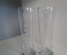 2 tall Costa glasses