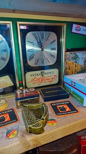 Vintage guinness brass clock