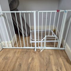 Baby gate with pet door