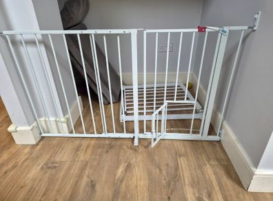 Baby gate with pet door