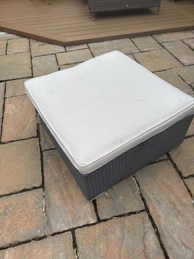 Rattan garden table with cushion
