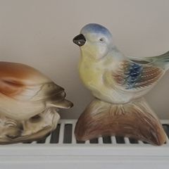 4 different bird ornaments